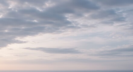 Obraz premium Ethereal Sky - Soft Pastel Clouds at Dusk, Serene Atmospheric Beauty.