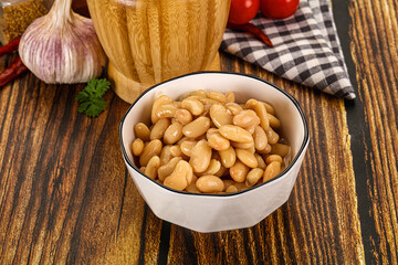 Baked white canned beans in the bowl
