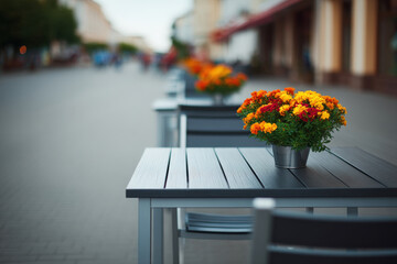 modern stylish outdoor caf featuring elegant flower arrangements on tables
