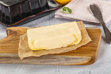 Dairy butter piece over board