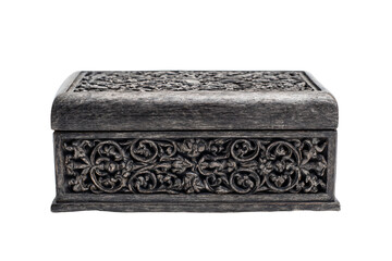 a wooden box with a carved design on it
