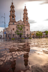 Catedral Bas&iacute;lica of Our Lady of the Assumption and Patria Plaza in Aguascalientes after the rain, Mexico. 