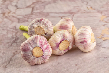 Raw young garlic bulb heap
