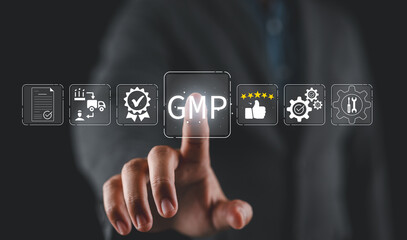 Good Manufacturing Practice (GMP) Concept. Businessman touching GMP with icons representing quality control, manufacturing assurance, standards,  regulatory compliance, certification, certified,