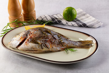 Baked dorada fish with spices