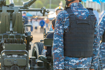  soldier in camouflaged uniform military armored vest 