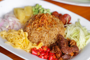 Aromatic Rice Dish: An overhead shot of a beautifully plated rice dish showcases a harmonious mix...