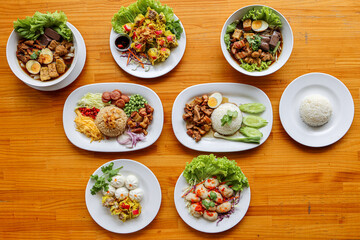 Culinary Feast: A captivating top-down shot showcases an array of colorful plates filled with a symphony of gourmet delights, celebrating the art of gastronomy.