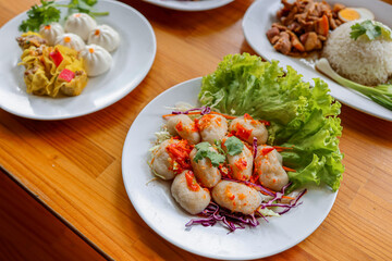 Exquisite Culinary Spread: A vibrant collection of delectable dishes, artfully arranged on pristine white plates, offering a tantalizing glimpse into a gastronomic adventure. 