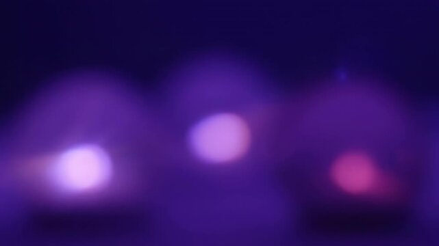 Soft Purple and Pink Light Orbs Gently Pulsating to Create a Dreamy Optical Flare in a Seamless Loop looping, romantic, bokeh