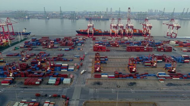 Aerial view of the cargo terminal of Tianjin Port at dusk