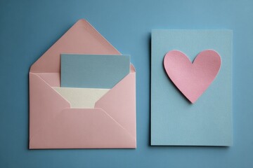 Pink envelope, blank note, light blue card, pink heart