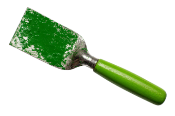 a spatula with a green handle on a white background