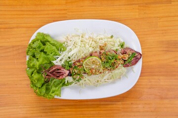 Artistic Culinary Creation: A meticulously arranged plate showcases an exquisitely prepared culinary masterpiece, harmoniously blending textures and flavors to tantalize the senses.