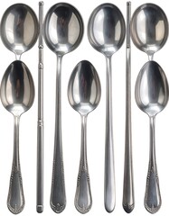 A collection of polished, stainless steel spoons, showcasing various handle styles and bowl shapes, against a plain white background.