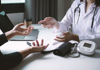 An Asian female doctor made an appointment for a patient to hear the results of the examination and...