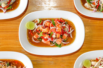 Culinary Feast: A top-down view of various dishes, showcasing vibrant colors and appetizing presentations. Focusing on the freshness of ingredients and intricate preparation.