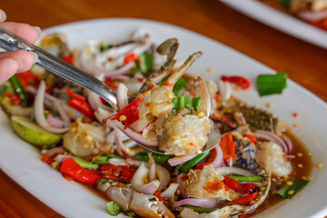 Appetizing Culinary Masterpiece: Close-up captures a tantalizing array of fresh crab salad, a fusion of textures and flavors, enticing viewers to savor the culinary delight.
