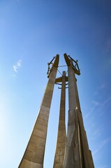 Poland Gdańsk, September 23, 2022, Monument to the fallen shipyard workers - consists of three metal crosses placed in front of the shipyard in Gdańsk