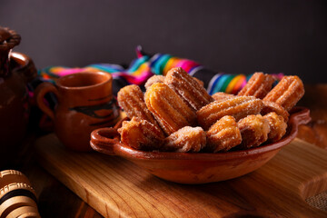 Churros. Fried wheat flour dough, a very popular sweet snack in Spain, Mexico and other countries where it is customary to eat them for breakfast or snack accompanied by hot chocolate or coffee.