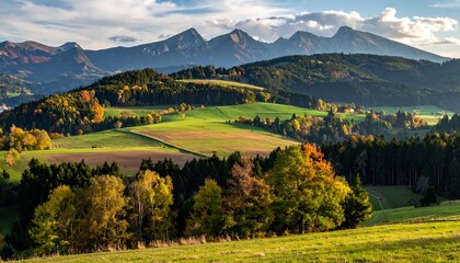 A picturesque autumnal landscape showcases rolling hills, vibrant foliage, and majestic mountains under a light, sunny sky.