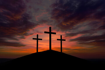 Three Crosses Silhouette on Hill at Sunset Sky