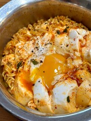 Delicious bowl of ramyeon with flavorful broth, tender noodles, and savory toppings. A comforting and satisfying Korean dish, perfect for a quick meal or cozy night in. Spicy, hearty, and delicious!