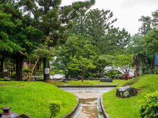 Lush Green Garden with Stone Path and Tropical Foliage in Taiwan