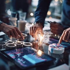 A group of people are working on a project with a light bulb on a table