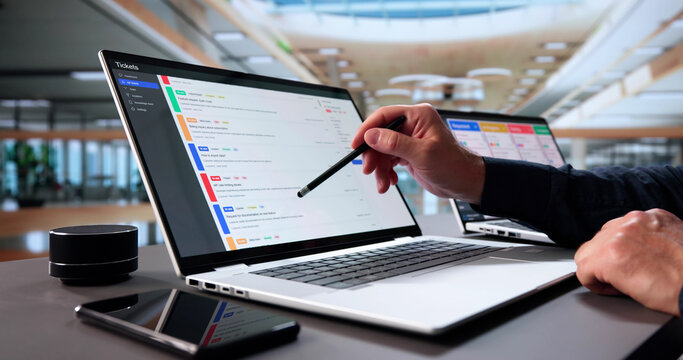 Senior Man Provides Remote Technical Support