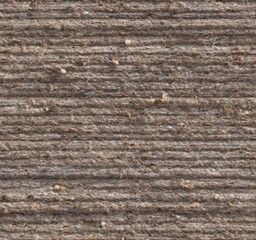 Textured Brown Surface: A macro shot captures the intricate texture of a brown surface, showcasing lines and layers that hint at the age and history within the object.