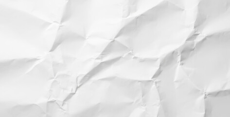 Obraz premium White crumpled paper texture with shadows and folds abstract background, emphasizing organic patterns, layered creases, and soft lighting effects.