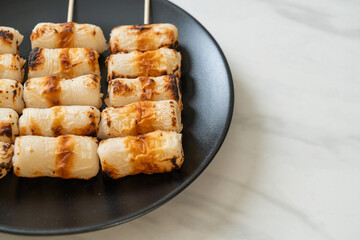grilled tube shaped fish paste cake skewe or tube squid skewer