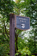 The sign at the entrance of Latourell Falls, a beautiful park and trail with waterfall view in the Columbia River HIghway in Oregon, in the Pacific Northwest. Vertical orientation. 