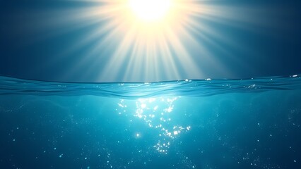 Sunlight streams through ocean waves, creating a mesmerizing play of light and shadow in deep blue waters.