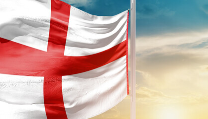 England national flag waving in an amazing sunlight. National flag waving on mast.
