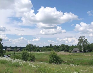 Wide shot of a rural landscape under a partly cloudy sky (1)