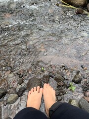 feet on the rocks