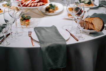 Elegant dining setup with exquisite dishes and fine glassware for a special occasion