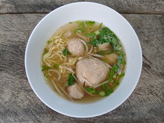 bakso super top view, meatball soup with noodles, indonesian cuisine
