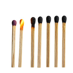 Close-up of a group of red-tipped wooden matchsticks on a white background