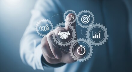 Businessman touching virtual gears with icons representing business strategy concept