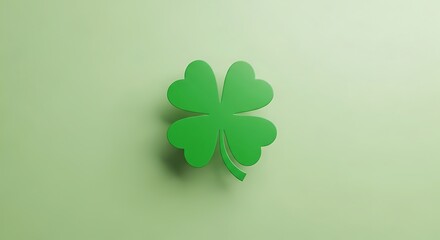 Green four-leaf clover icon with a subtle shadow on a light green background, symbolizing good luck and Irish heritage.