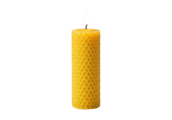 Isolated lit beeswax candle with honeycomb pattern, yellow pillar design for home decor use