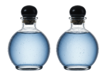 Isolated clear glass bottles with blue liquid, stoppered with dark cork on neutral backdrop