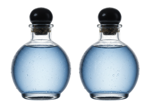 Isolated clear glass bottles with blue liquid, stoppered with dark cork on neutral backdrop