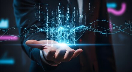 Businessman holding glowing digital data stream in hand representing technology and innovation.
