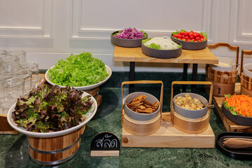 Fresh Salad Bar Display: A vibrant and inviting array of fresh, colorful salad ingredients,...