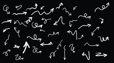 Set of hand drawn arrows doodle on black background.