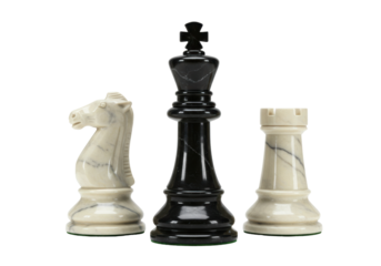 Isolated chess pieces King, Knight and Rook, a marble chess set displayed with a tall King